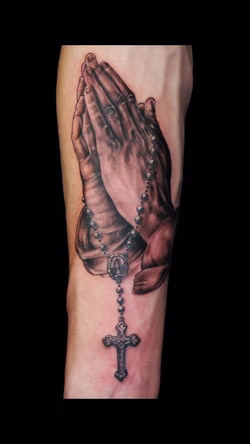 Praying Hands Tattoo done by Jesse